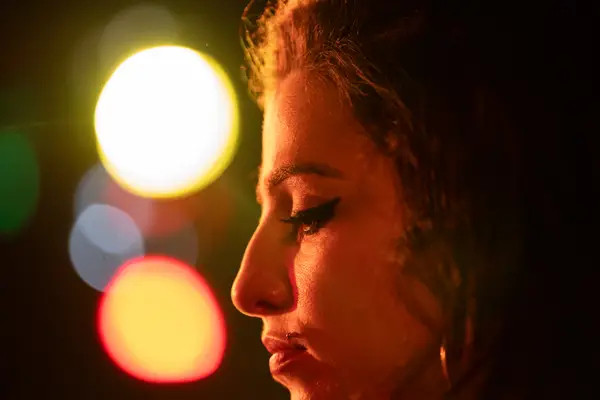 A close-up of Marisa Abela in