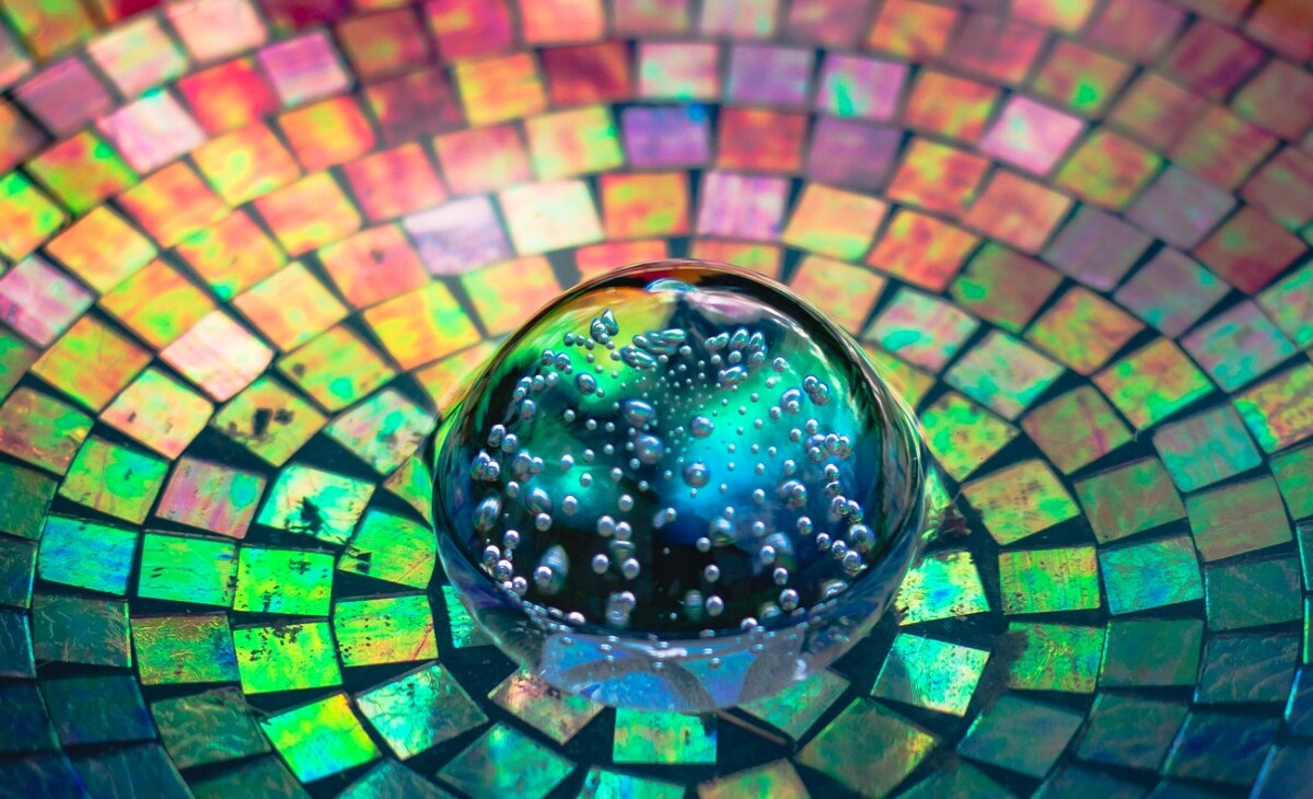 water drop on colored mirrors