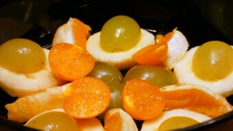 Peach jelly with fruit and whipped cream