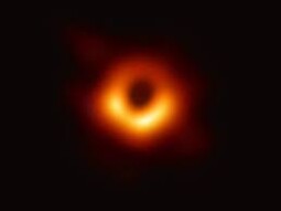 About background radiation, spacetime curvature, and empty space