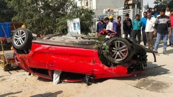 Car falls off flyover