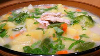 Vegetable soup ,,Jarzynówka,, with potatoes and pieces of chicken