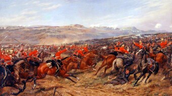 What is the role of repetition in Tennyson's 'Charge of the Light Brigade'?