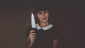 Catching a falling knife is hard, but you can try to grab the hilt as it goes past you !