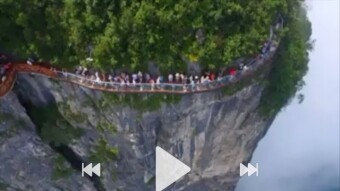 The greatest tourist-place is Tianmen mountain of Chaina.