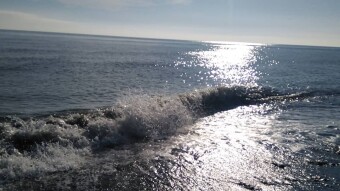 Sunlight, as If Diamonds Are Scattered Over The Azure Sea