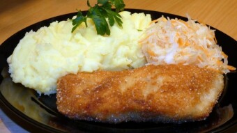 Fried common carp with puree potatoes and sauerkraut salad