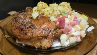 Classic Sunday lunch - homemade duck broth and roasted chicken thighs with potatoes and salad