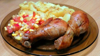 Juicy chicken in herbs, baked in a bag, with vegetable and Chinese cabbage salad