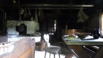 Time travel - comparison of two houses from the 19th century. A peasant's house and a rich peasant's house on the basis of houses in the Silesian open-air museum