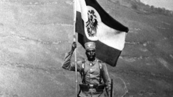 The Logoi of Prussia and Africa United in the Black American