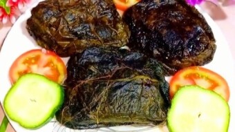 Video de receta de paturi de pescado pangasius en verduras de hojas verdes