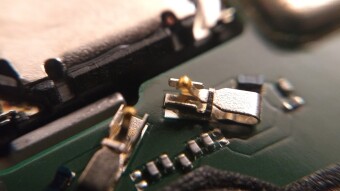 Dirty-fixing a mobile phone: Close-up photography