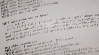 Merriam-Webster is auctioning a NFT of the definition of NFT, current bid at 7 ETH with one day to go