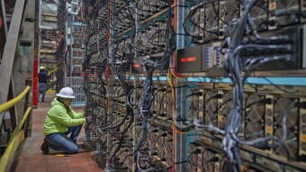 What does bitcoin mining mean and why are they called miners?