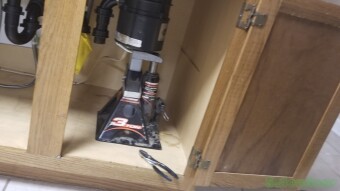 Installing a new garbage disposal, and how a car jack saved the day.