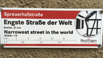 Let's go through the narrowest street in the world.