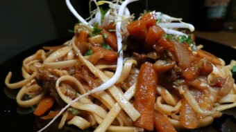 Stewed pork with vegetables, Chinese cabbage and noodles