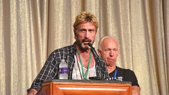 John McAfee Arrested for Tax Evasion, Also Sued by SEC for Securities Violation Charges