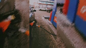 Creative Lada Vesta at the gas station. Shall we refuel?