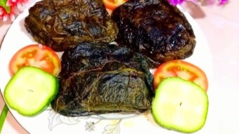 Video de receta de paturi de pescado pangasius en verduras de hojas verdes