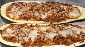 Baked squash with meat, couscous and cheese