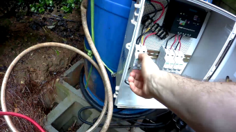 Transferring condensate water from barrel to barrel using my solar powered pump