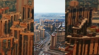 Flying over the city. Drone view