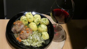 Pork cheeks with vegetables and young cabbage