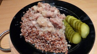 Pork stew with buckwheat and pickled cucumber