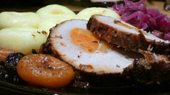 Roast pork chop with apricots, red cabbage, and noodles
