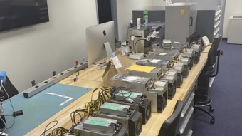 A Massachusetts man has been charged with concealing a cryptocurrency mining rig in a school
