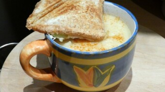 Homemade cream soup of cauliflower and potatoes with croutons