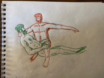 Joe and Ahmad intertwined on the couch - couch not depicted