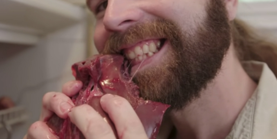 Man Eating Raw Meat