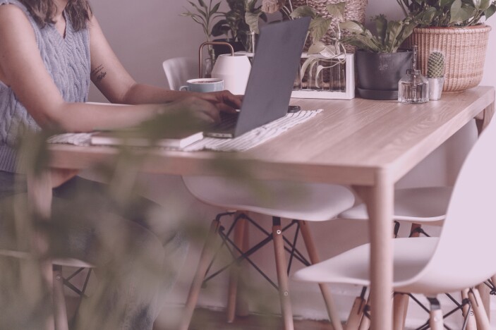 woman working on her laptop from home