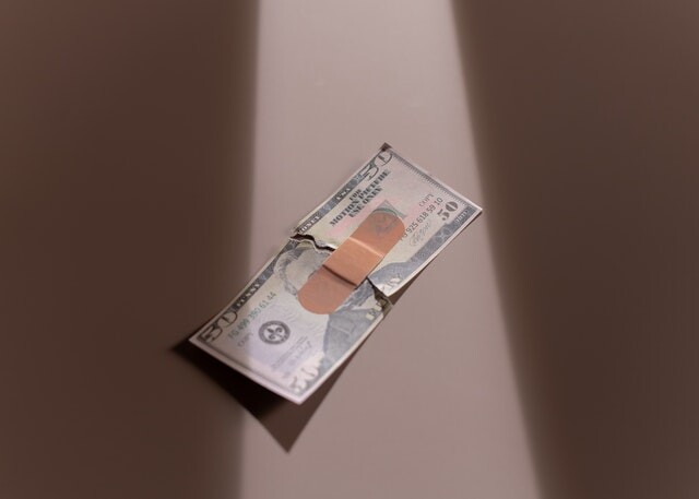 band-aid on money