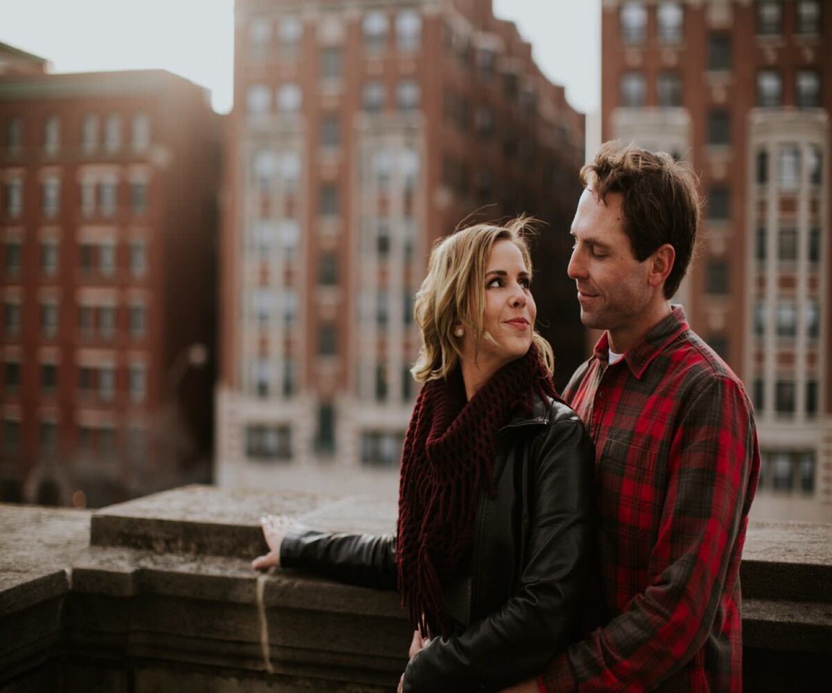couple hugging at war memorial in downtown indy