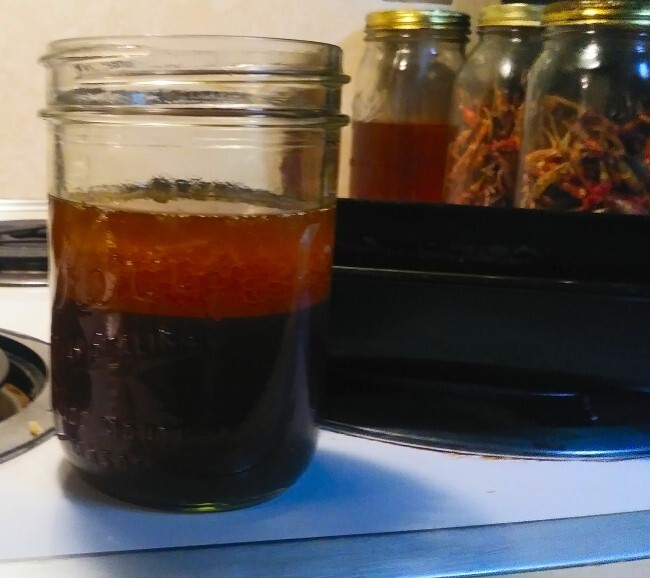 Chicken drippings poured into Mason jar