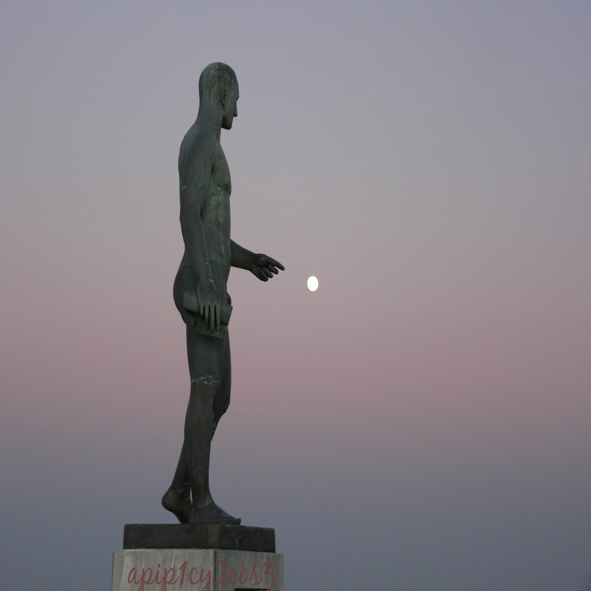 The statue and the moon