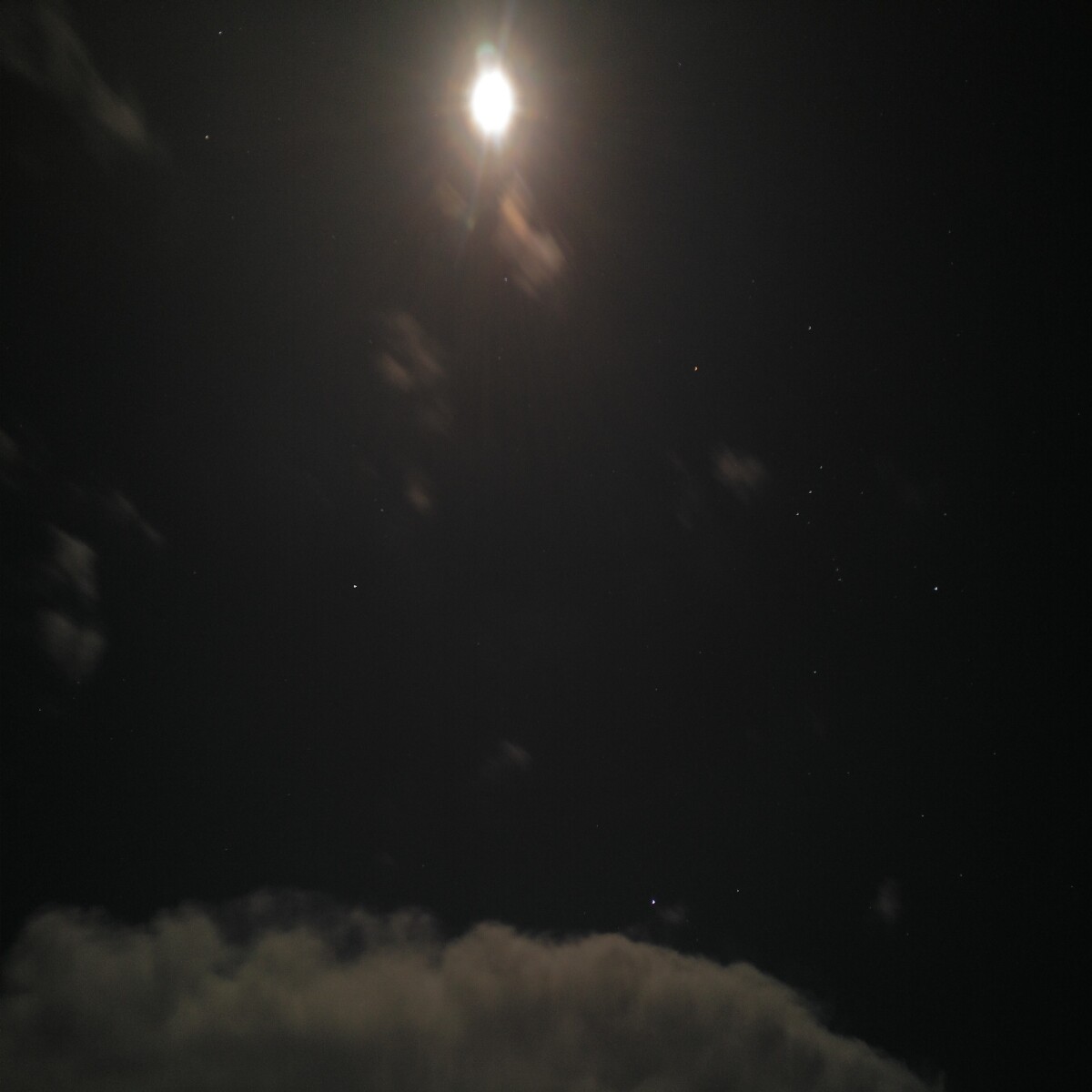 Full moon with cloud and stars.