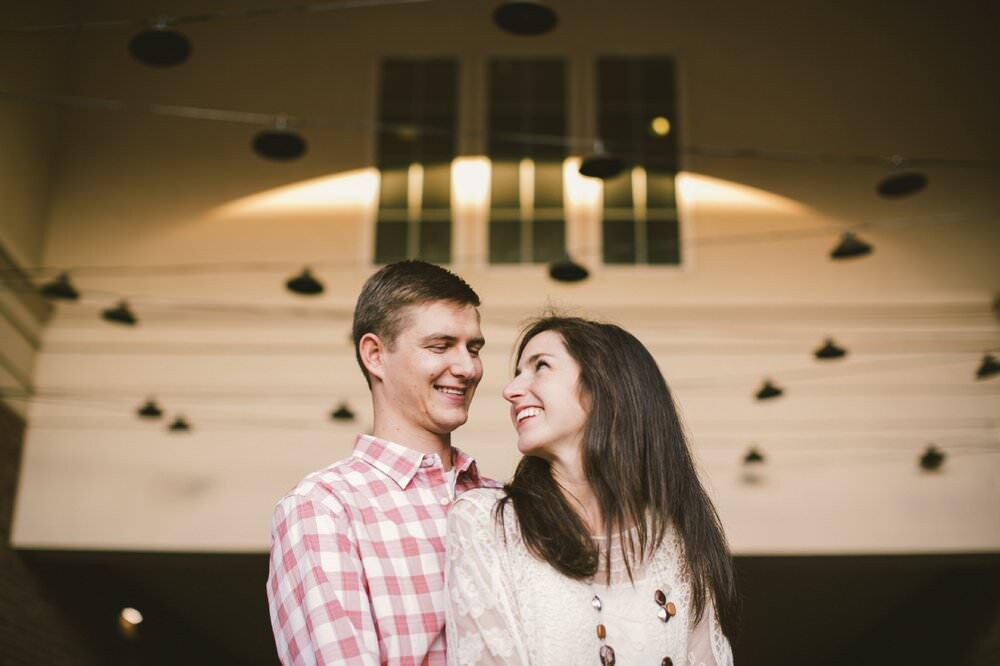 couple hugging in bar in downtown carmel