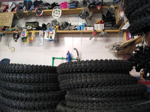 Photography of Cycling, The Story of Repairmen &amp; a Friend