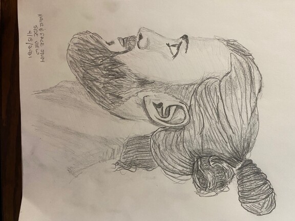 Side view of man with bun - pencil sketch