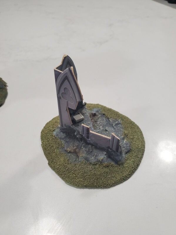 A Gothic cathedral fortification mounted on a base