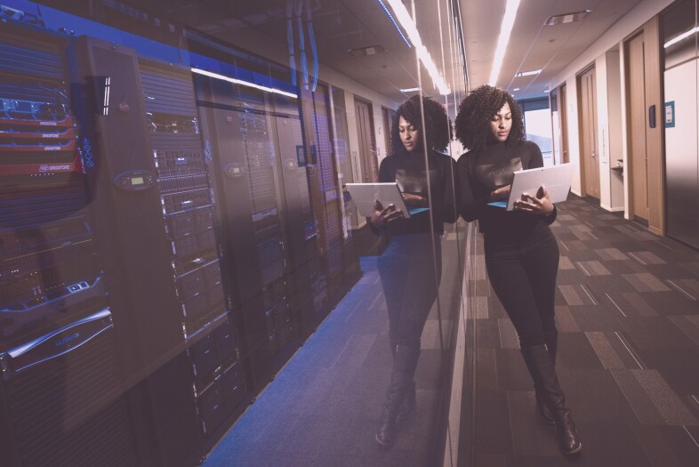 Woman at a tech company working on her laptop