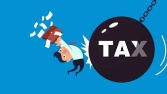 Fiat Money and Taxes