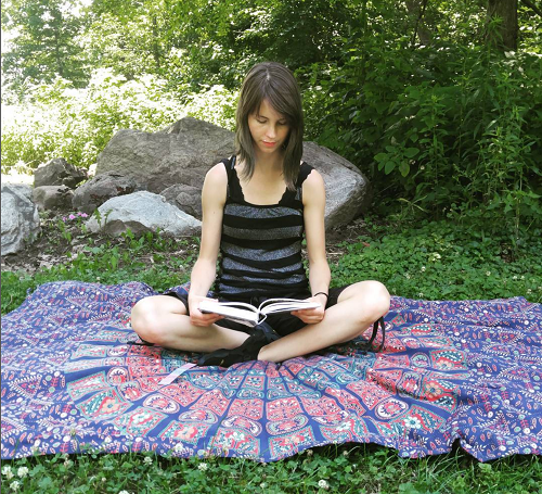 me reading at a park