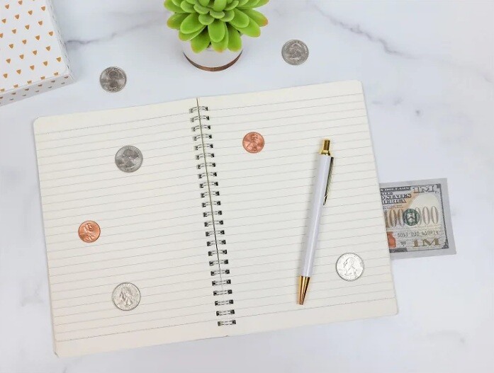 notebook and coins