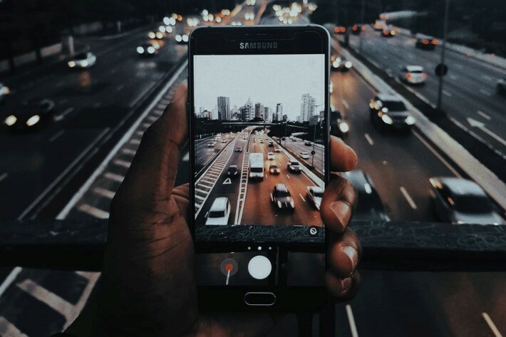 Person Taking a Picture With Their Phone